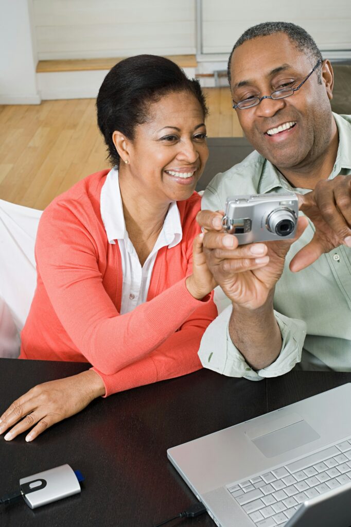 Mature couple with digital camera